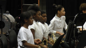 Band students waiting to perform their piece.