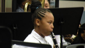 A clarinet player performing during the concert.