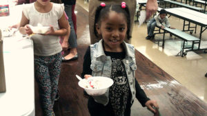 A Jefferson student showing her ice cream reward.