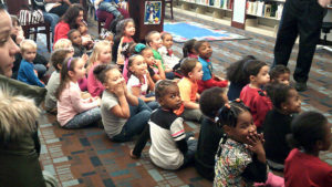 Students excited to see Santa come into the room.