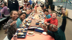 Mrs. Francisco's class enjoying their Thanksgiving lunch together.