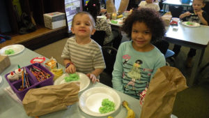 Two students enjoying their breakfast.