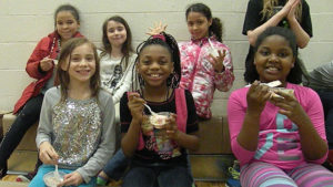 A group of Jefferson students enjoy the music and ice cream reward.