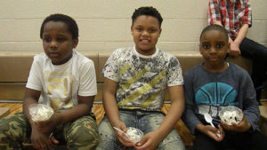 Three Jefferson students enjoy their ice cream during the dance.