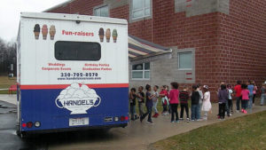 Students wait in line at the Handel's ice cream truck.