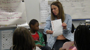 A student talks about the poem created by her student.