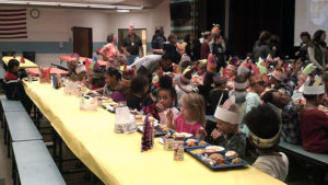Students enjoying their Thanksgiving lunch.