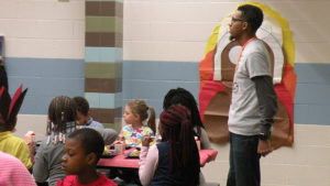 Pastor Todd volunteers his time to help with lunch.