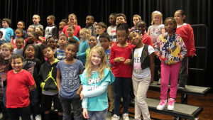 Students pose for a photo before the concert.