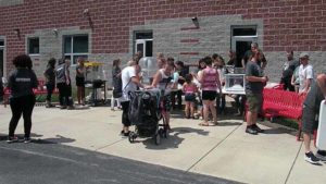 Teachers and families enjoying the carnival.