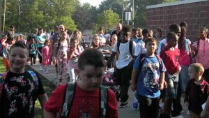 Students coming in for their first day.