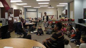 Students listen as Mayor Franklin reads a story.