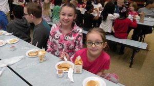 Third grade students take a break for a quick picture.