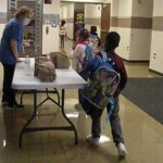 Students receive breakfast every morning before going to class.