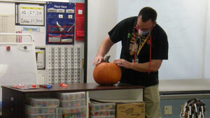 The class counts the lines on the pumpkin