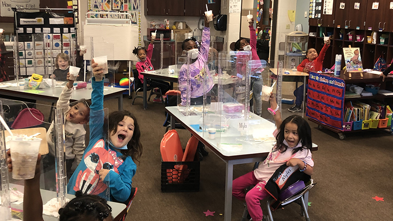 Students enjoy their tasty treat.