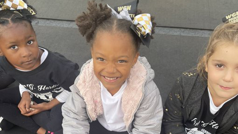 Jefferson student smiling for the camera before the mini majorette performance.