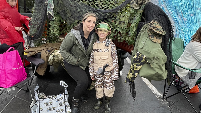 Ms. Dicesare helps at trunk or treat.