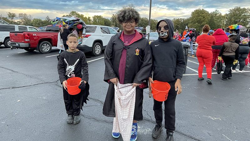 Students dressed up and ready for trunk or treat.