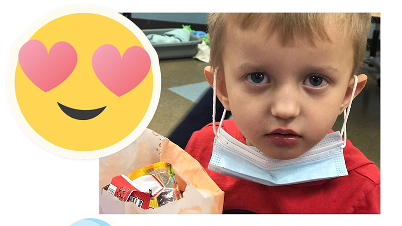 A student collecting his valentine treats.