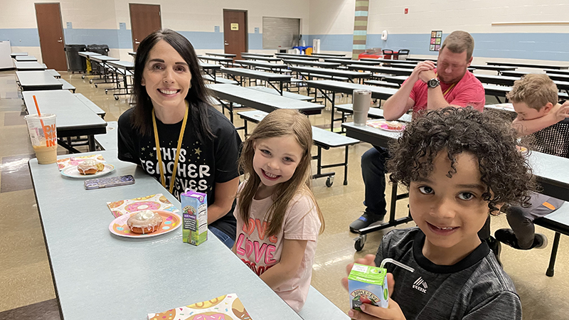 Mrs. Smith celebrates with her donut award winners.