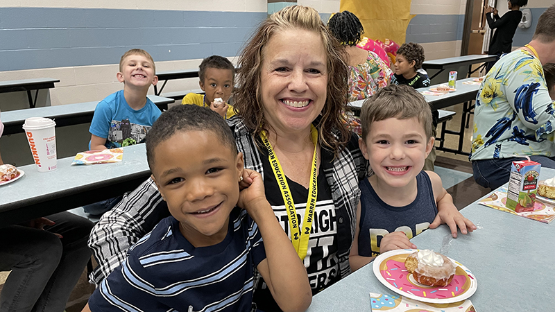 Mrs. Roberts celebrates with her donut award winners.