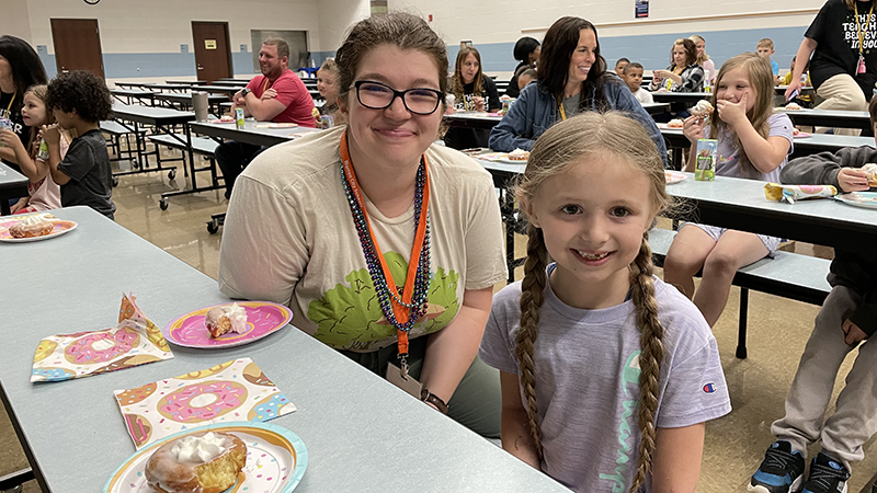 Miss O celebrates with her donut award winner.