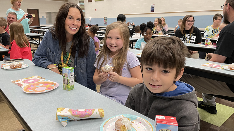 Mrs. Hammond celebrates with her donut award winners.