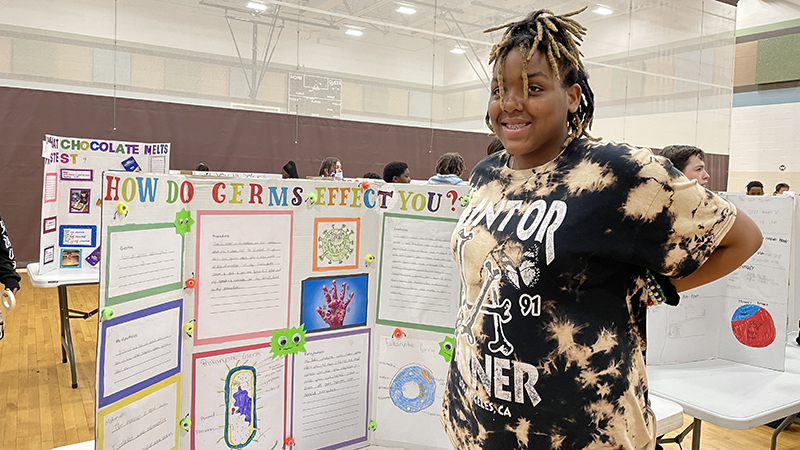 A student with her project about germs.