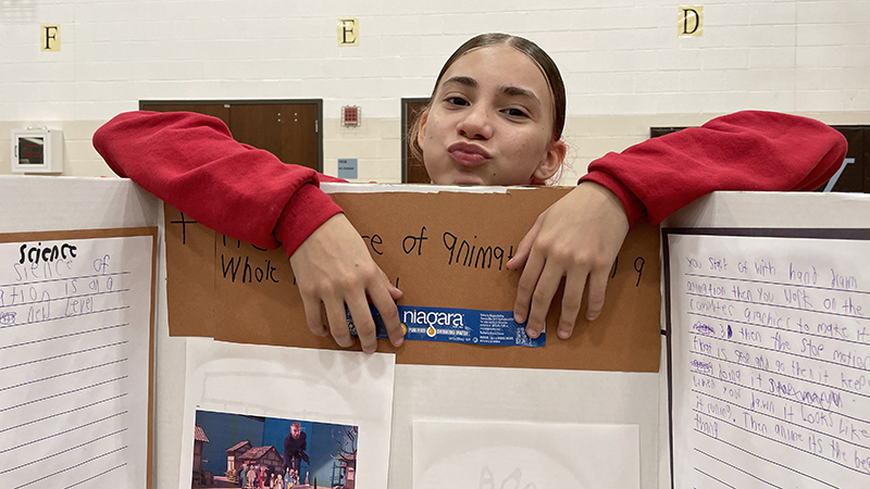 A sixth grader at the science fair.