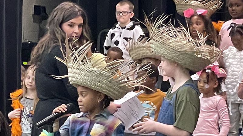 Students say their lines for the musical.