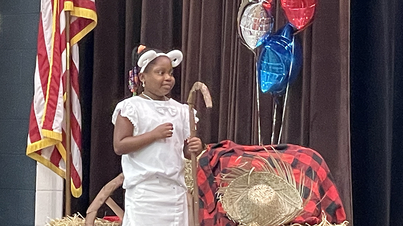 A student playing Little Bo Peep