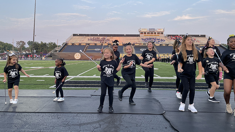 Jefferson students performing a majorette routine.