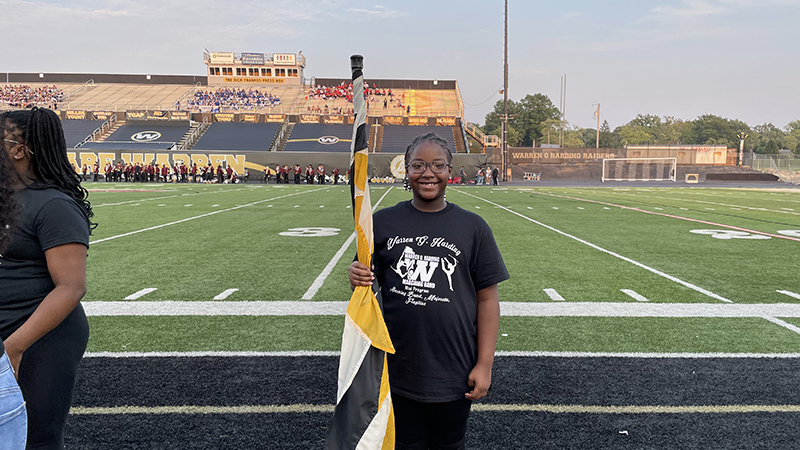 Jefferson student participating in mini flag line.