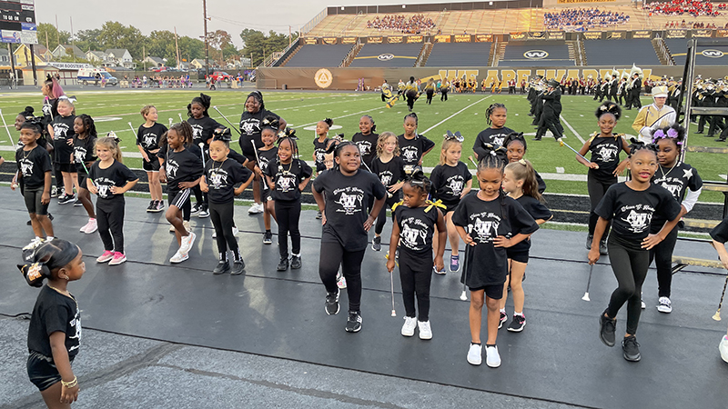 Mini majorettes performing.