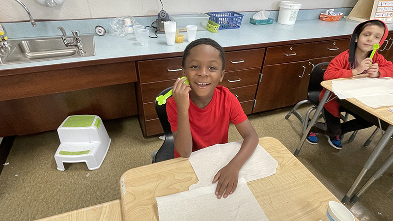 First grader ready for his apple pie.