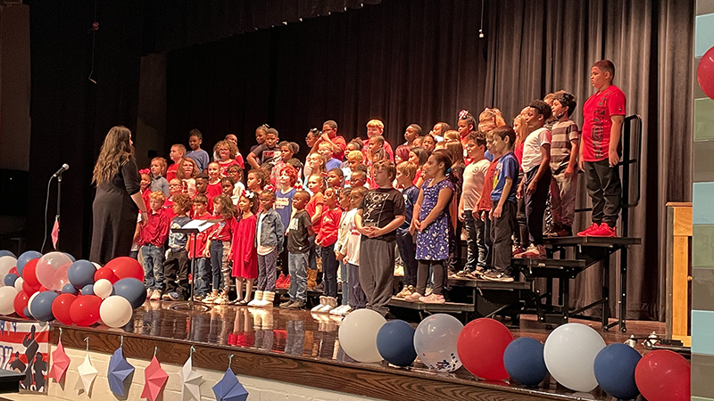 Students waiting patiently to start their performance.