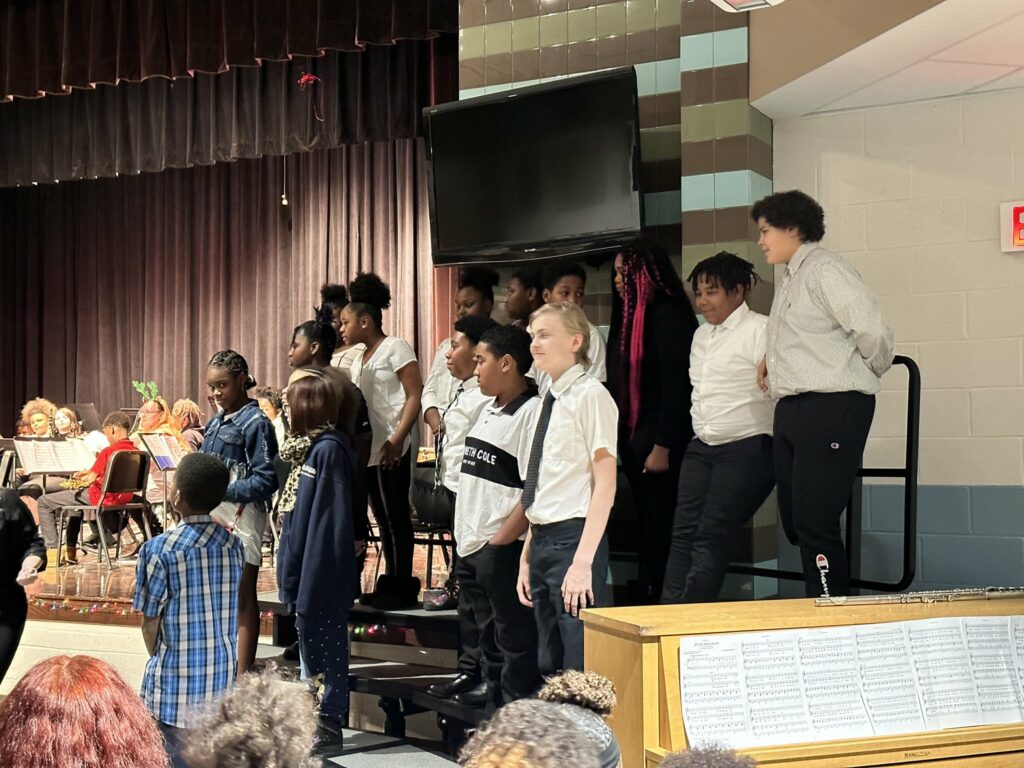 Choir students waiting to perform for the audience.