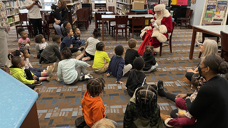 Students listen to Santa.