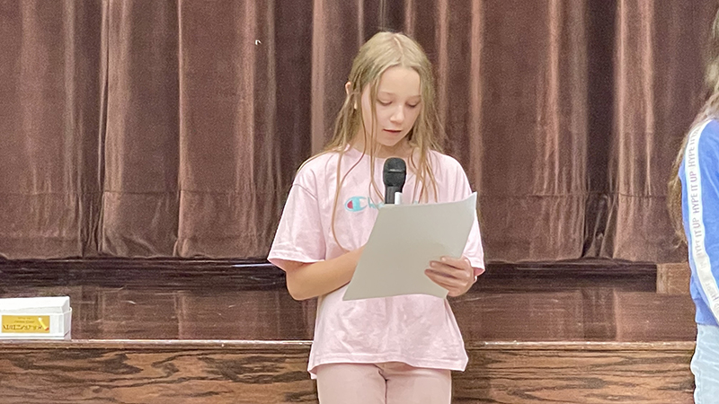 Macey talks about her service project.