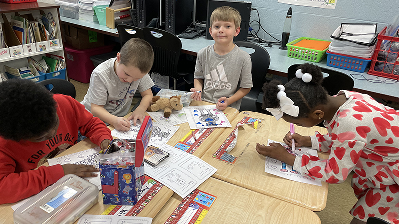 Second grade students working on a Valentine activity.