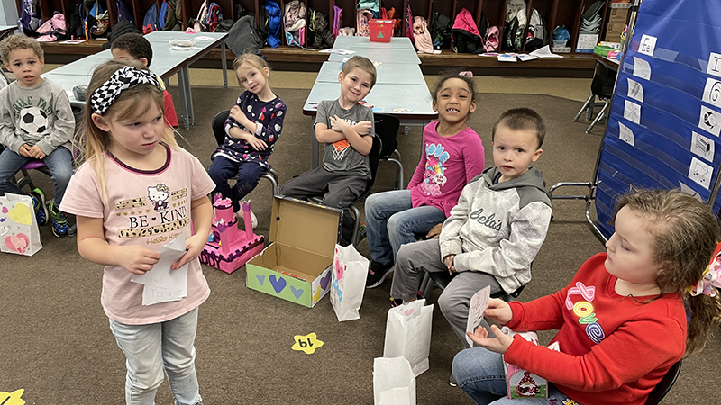 Kindergarten students waiting to pass out Valentine's.