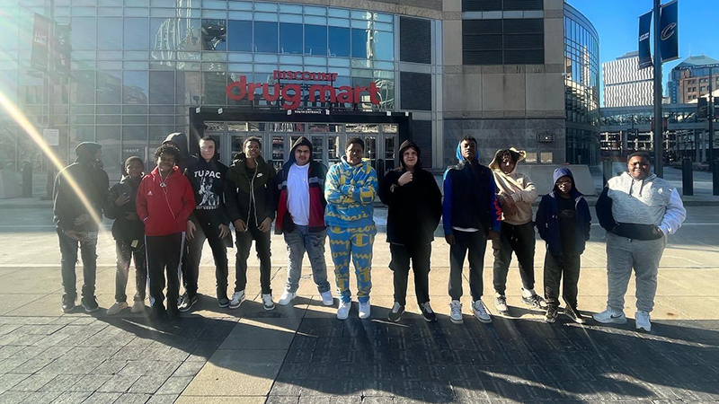 Students in front of the stadium.