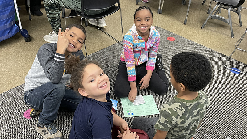 A group of first graders ready to play.