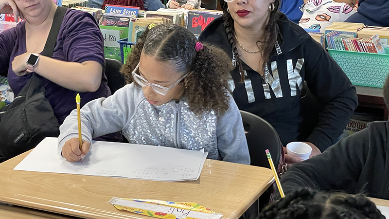 A student works on her math activity.