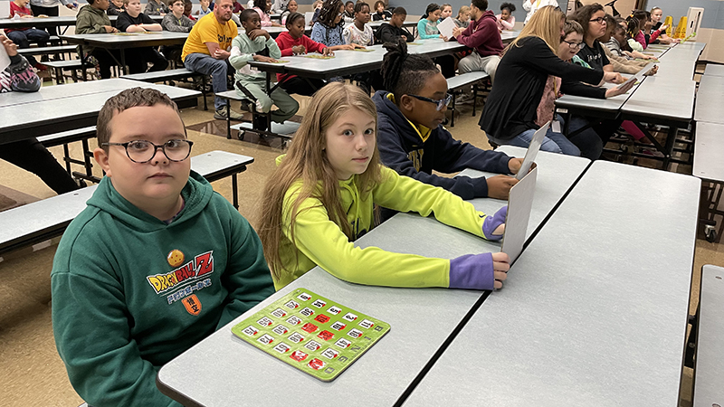 Students wait for the next bingo number to be called.