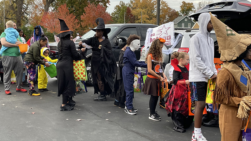 Students enjoy trick or treating.