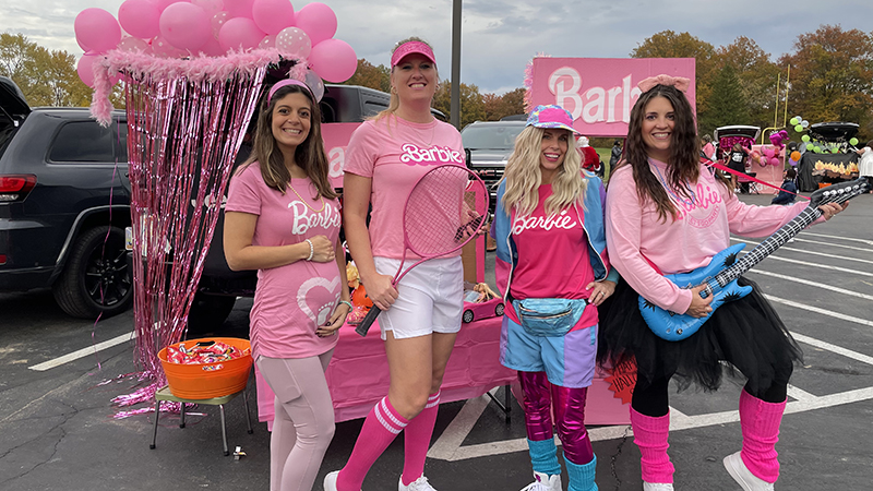 Second grade teachers showing off their Barbie costumes.