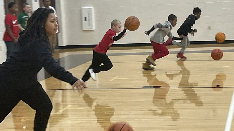 Students compete in a relay race.