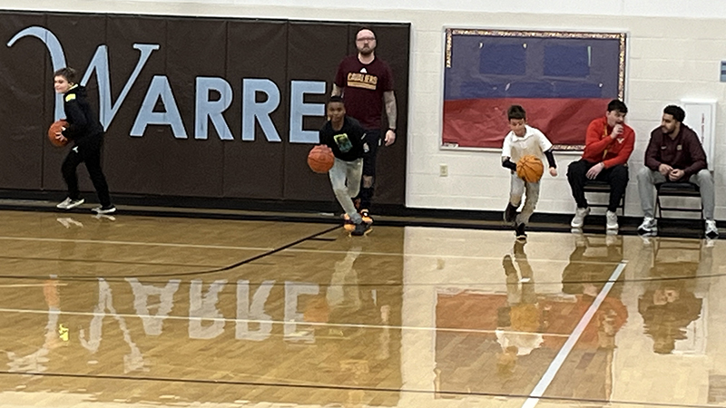 Students compete in a relay race.